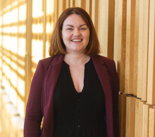 Helen Duffy, Research Lead with the Business and Commercialization Innovation Centre (BCIC) in a hallway at Niagara College.