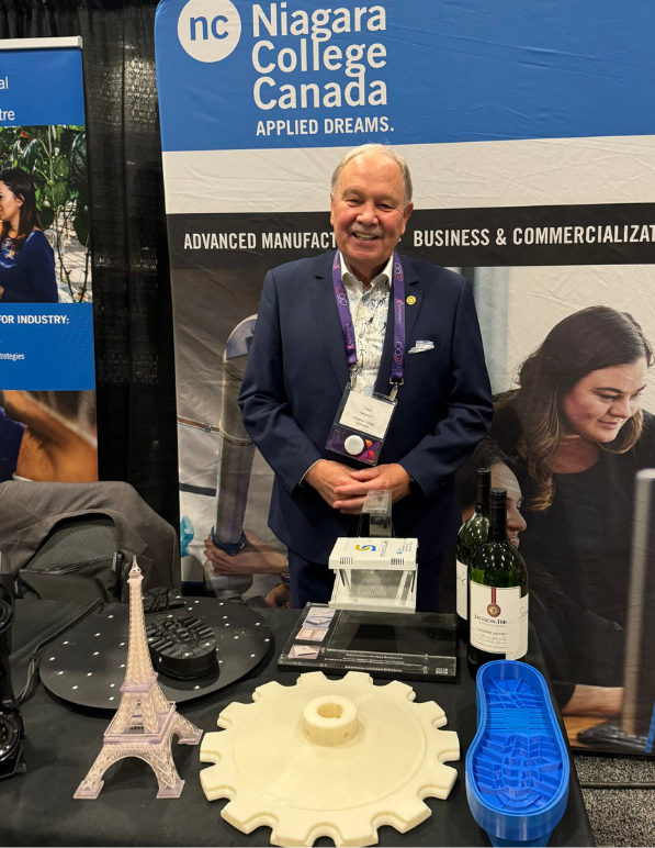 Dan J. Patterson, former President of Niagara College, visits Research and Innovation's booth at DiscoveryX 2024