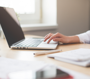 Laptop and paperwork