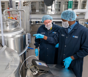 [Preview] Pilot Plant Production Specialist Brad Barta and student researcher Anthony Akoh in the Pilot Plant production lab.