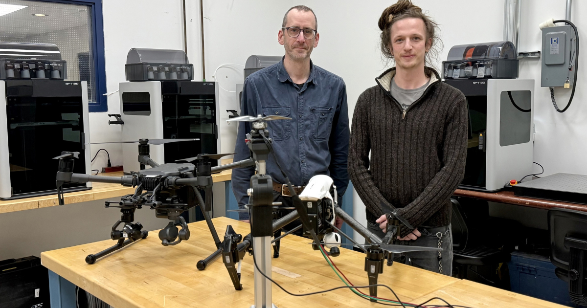 DSET Program Coordinator Alexander McGlashan (left) and NC WAMIC Electronics Engineering Research Assistant Kainaan Riordan.